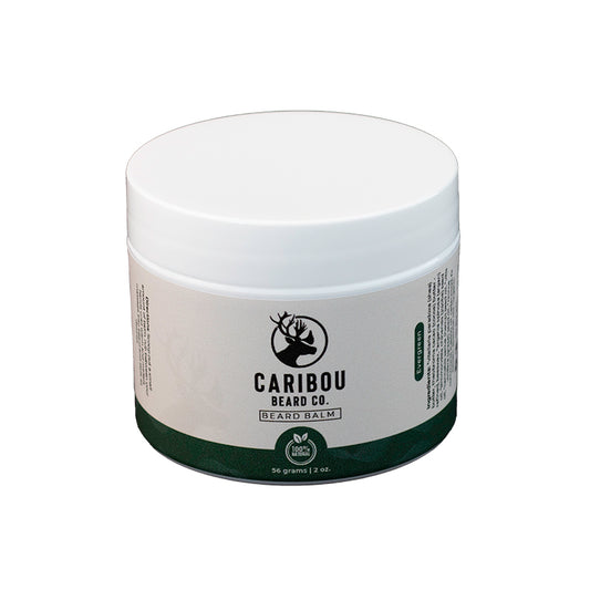 A 2oz/56 gram white jar of Caribou Beard Co Beard Balm in Evergreen scent